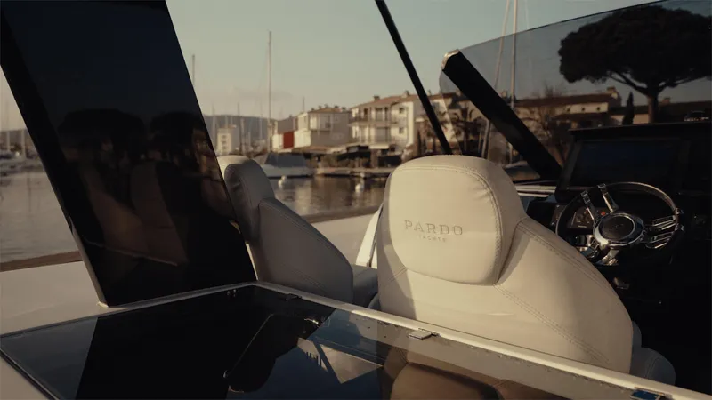 Mea Yacht Photos Pics Luxury interior of 2022 Pardo Yachts 43, featuring sleek design and modern steering.