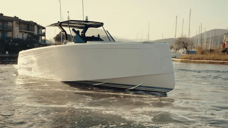 Mea Yacht Photos Pics 2022 Pardo Yachts 43 cruising in a marina with scenic background.