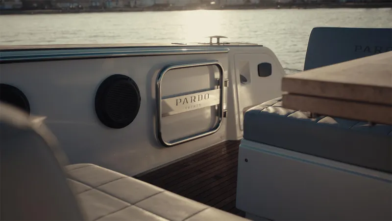 Mea Yacht Photos Pics 2022 Pardo Yachts 43 interior, featuring elegant seating and sleek design at sunset.