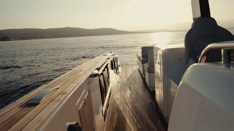 Mea Yacht Photos Pics 2022 Pardo Yachts 43 cruising on serene waters at sunset.