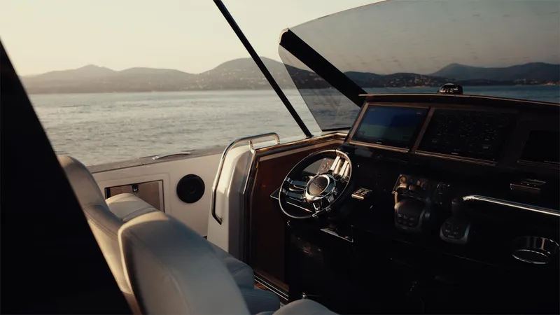 Mea Yacht Photos Pics Interior view of 2022 Pardo Yachts 43, showcasing helm and ocean backdrop.