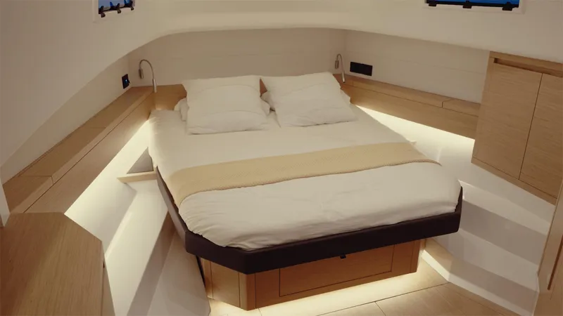 Mea Yacht Photos Pics Luxurious cabin interior of 2022 Pardo Yachts 43 with modern design and cozy bedding.