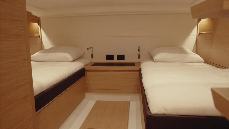 Mea Yacht Photos Pics Interior of 2022 Pardo Yachts 43, featuring twin beds and modern wooden design.