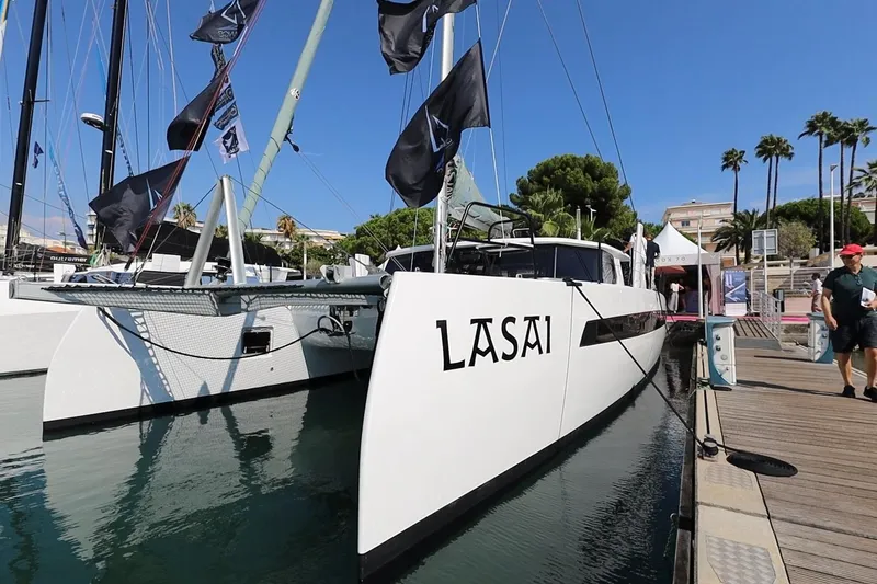 Lasai Yacht Photos Pics Modern Balance 442 catamaran docked at marina, 2023 model, with "LASAI" branding.