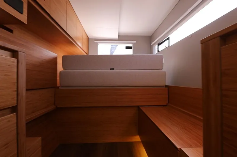 Lasai Yacht Photos Pics Modern wooden interior of Balance 442, 2023 model, featuring a compact bed setup.