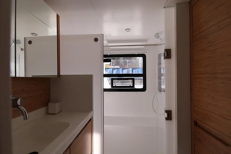 Lasai Yacht Photos Pics Modern bathroom interior in 2023 Balance 442 yacht, featuring sleek design and natural light.