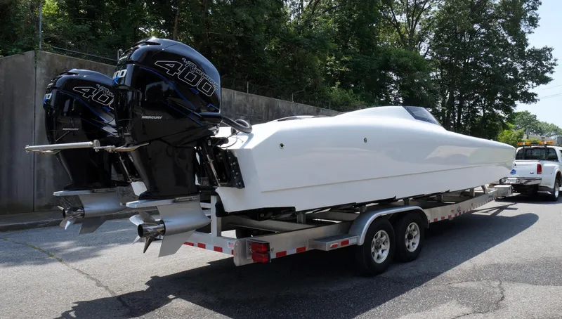  Yacht Photos Pics 2005 Doug Wright 32 boat on trailer with twin Mercury 400 engines.