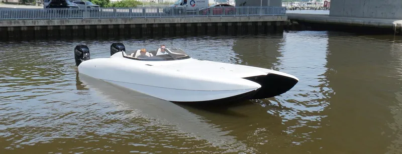  Yacht Photos Pics 2005 Doug Wright 32 powerboat with dual engines on a calm river.
