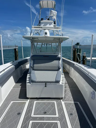  Yacht Photos Pics 2015 SeaHunter 41 Tournament boat with tower, docked on a sunny day.