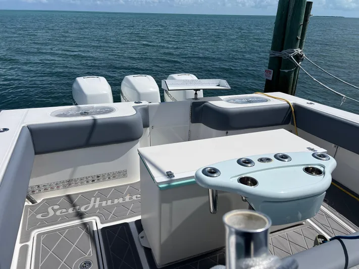  Yacht Photos Pics 2015 SeaHunter 41 Tournament boat deck with ocean view and fishing equipment.