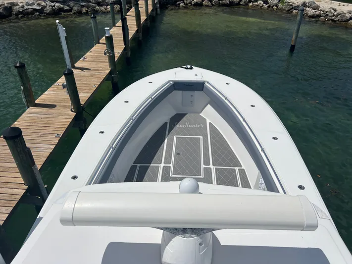  Yacht Photos Pics 2015 SeaHunter 41 Tournament boat docked on clear water.