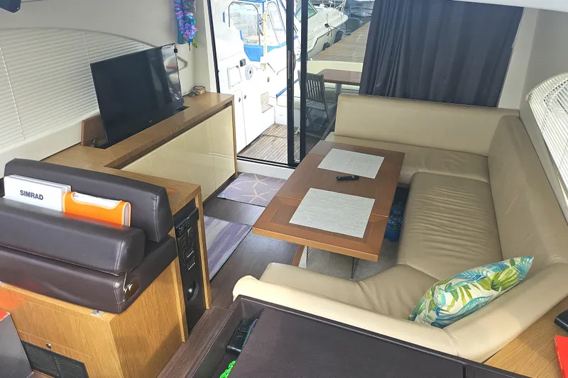  Yacht Photos Pics Interior of 2015 Beneteau Gran Turismo 49 yacht with cozy seating and modern amenities.
