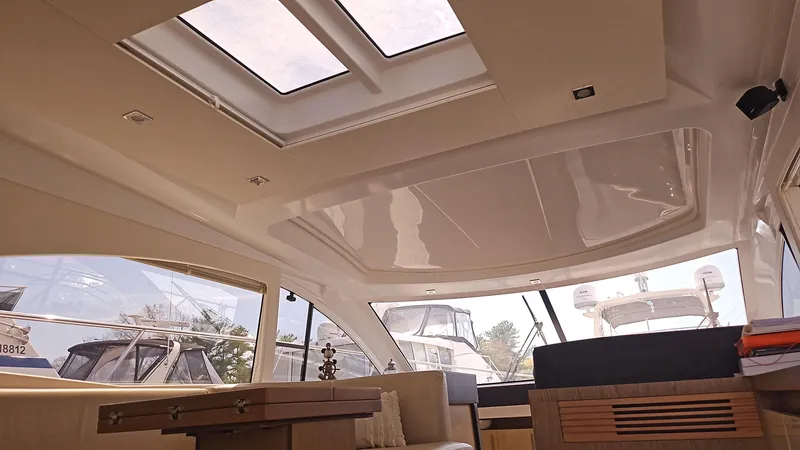  Yacht Photos Pics Interior view of 2015 Beneteau GRAN TURISMO 49 yacht with skylights and modern design.