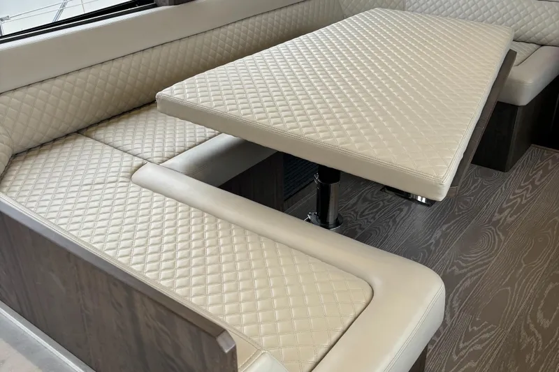  Yacht Photos Pics Luxurious interior seating on 2019 Galeon 500 Fly yacht with quilted upholstery.