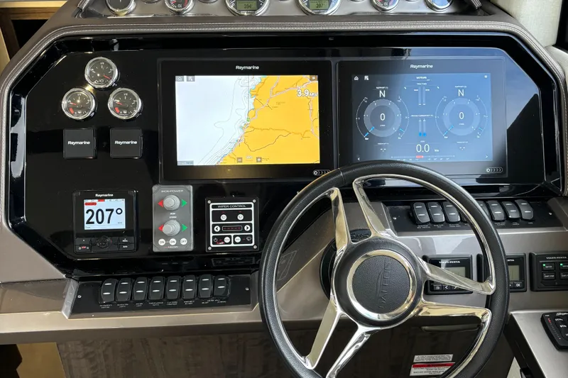  Yacht Photos Pics Helm of 2019 Galeon 500 Fly yacht with navigation screens and controls.