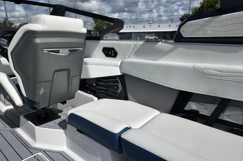  Yacht Photos Pics 2025 Nautique Super Air Nautique G25 interior with modern seating and sleek design.