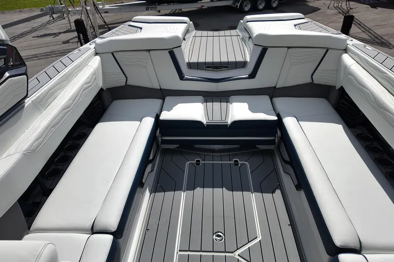  Yacht Photos Pics 2025 Nautique Super Air Nautique G25 interior with spacious seating and modern design.