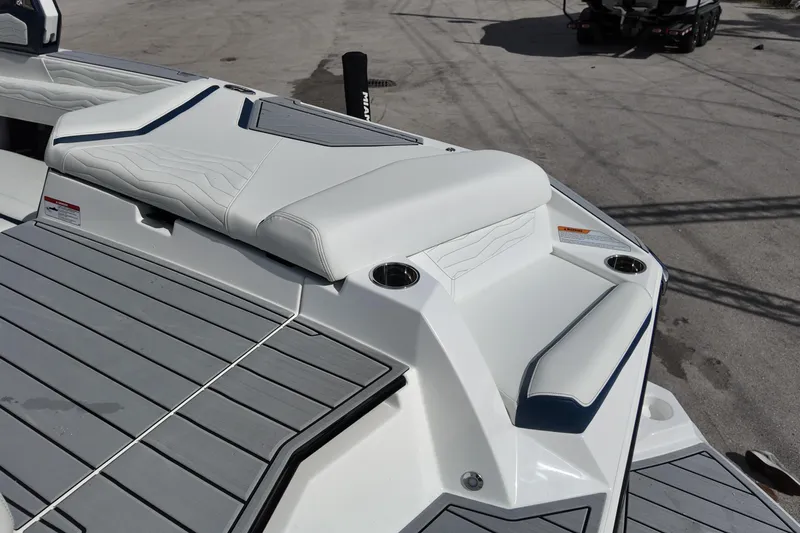  Yacht Photos Pics 2025 Nautique Super Air Nautique G25 boat with sleek seating and cup holders.