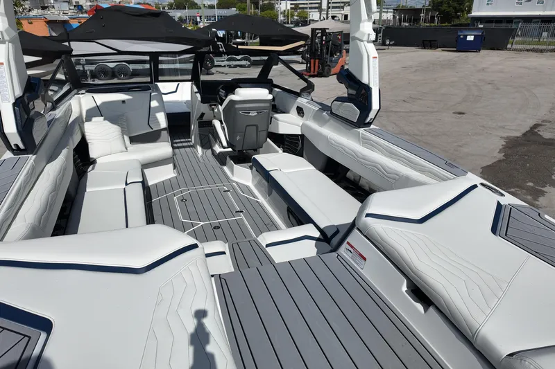  Yacht Photos Pics 2025 Nautique Super Air Nautique G25 boat interior with sleek seating and modern design.