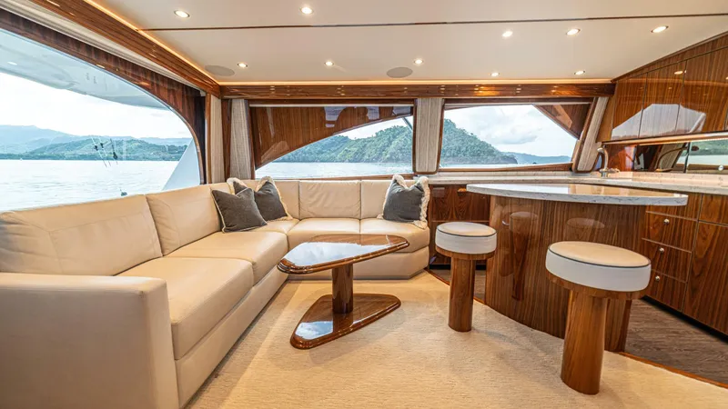 El Lobo Yacht Photos Pics Luxurious interior of 2020 Viking 58 Convertible yacht with elegant seating and scenic views.