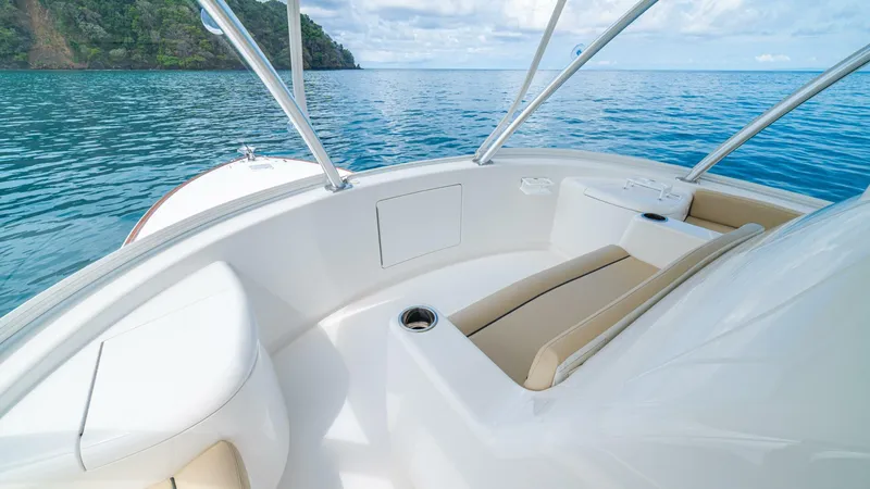 El Lobo Yacht Photos Pics 2020 Viking 58 Convertible yacht deck with ocean view and seating area.