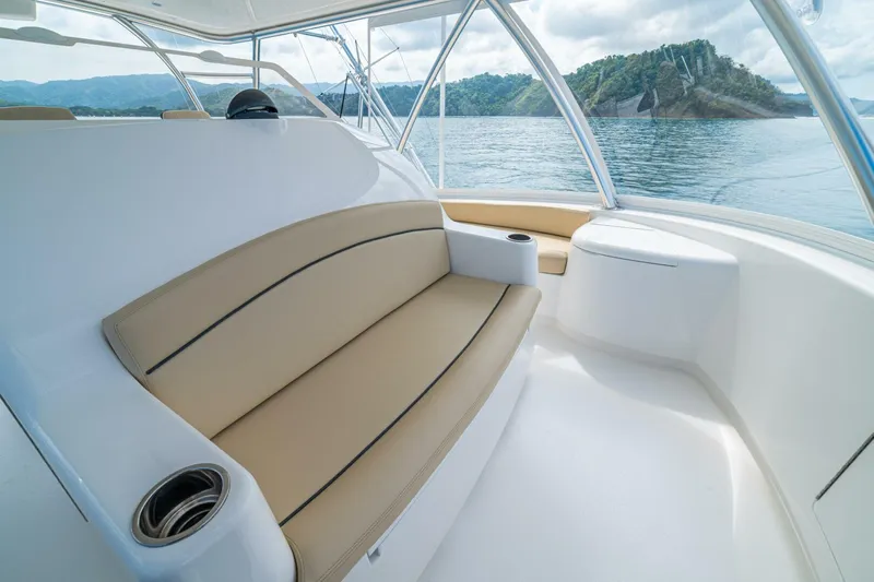 El Lobo Yacht Photos Pics Luxurious seating on 2020 Viking 58 Convertible yacht with scenic ocean view.