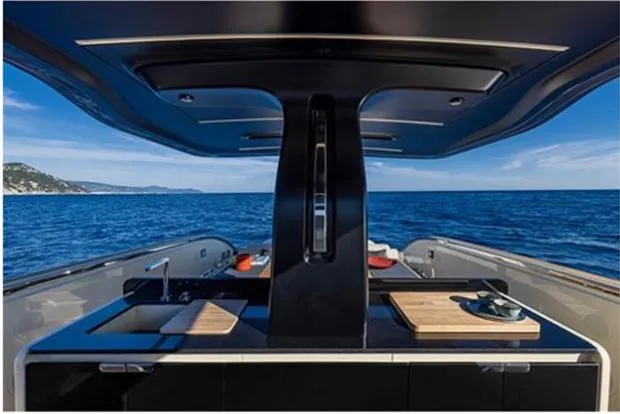  Yacht Photos Pics Luxurious 2021 Invictus TT460 yacht kitchen with ocean view.