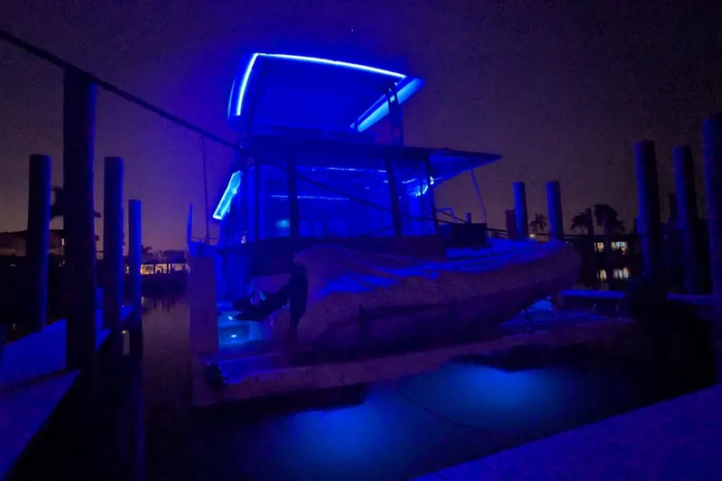 Fly Girl Yacht Photos Pics 2020 Fountaine Pajot MY 37 yacht illuminated with blue lights at night.