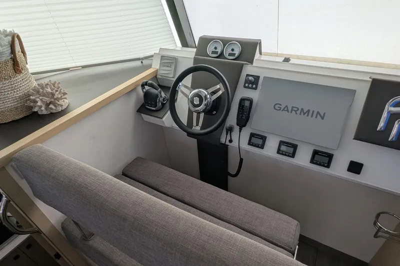 Fly Girl Yacht Photos Pics Helm of 2020 Fountaine Pajot MY 37 with Garmin navigation system and modern controls.