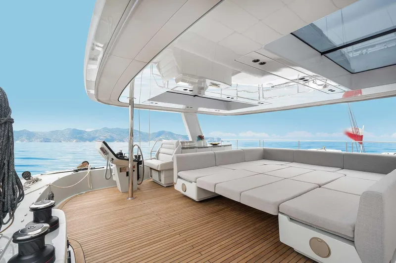 Candy Yacht Photos Pics Luxurious Sunreef 70 yacht interior, 2021 model, featuring spacious seating and ocean views.