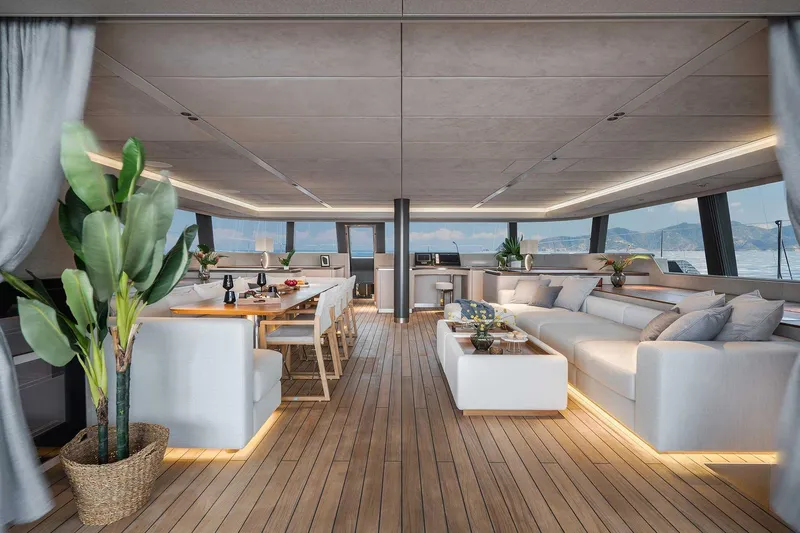 Candy Yacht Photos Pics Luxurious interior of 2021 Sunreef 70 yacht with elegant seating and dining area.