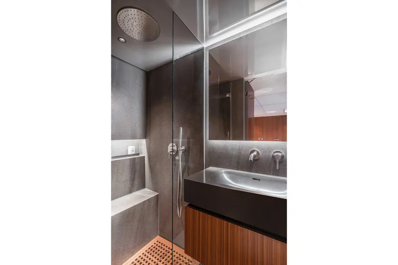 Candy Yacht Photos Pics Luxurious bathroom in 2021 Sunreef 70 yacht with modern fixtures and sleek design.