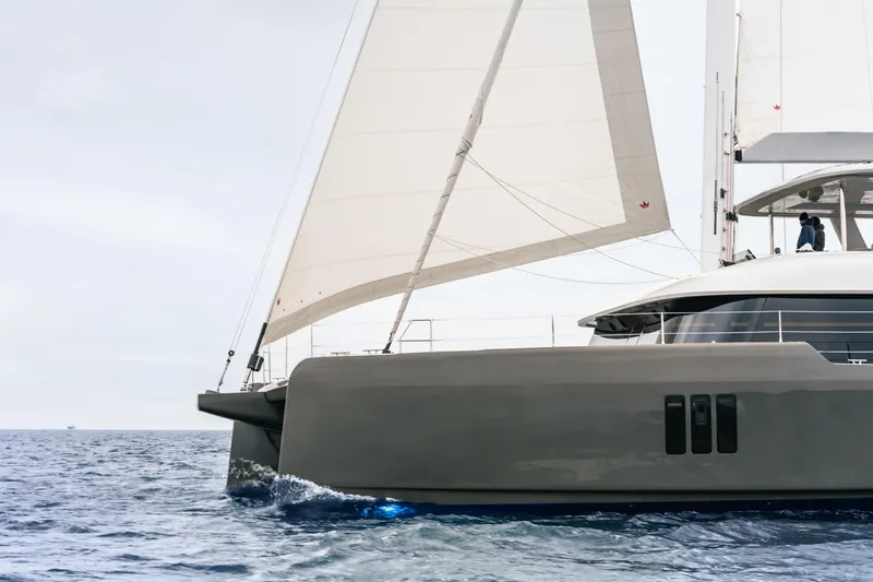 Candy Yacht Photos Pics Luxury Sunreef 70 catamaran sailing on open sea, 2021 model.