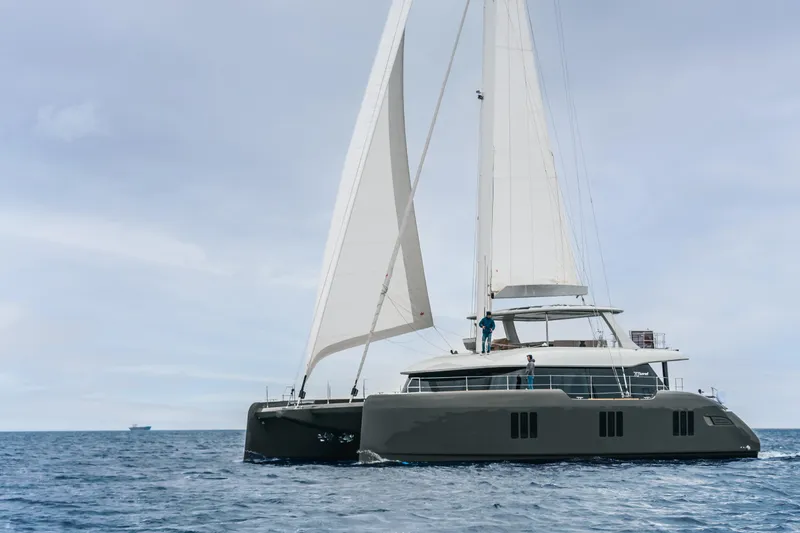 Candy Yacht Photos Pics Luxury Sunreef 70 catamaran sailing on open sea, 2021 model.