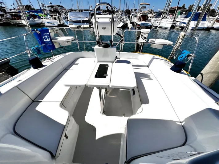 Alcyone Yacht Photos Pics Spacious cockpit of a 2007 Catalina 350 sailboat docked at a marina.
