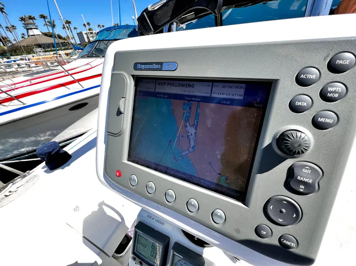 Alcyone Yacht Photos Pics Boat navigation system on a 2007 Catalina 350, docked in a marina.