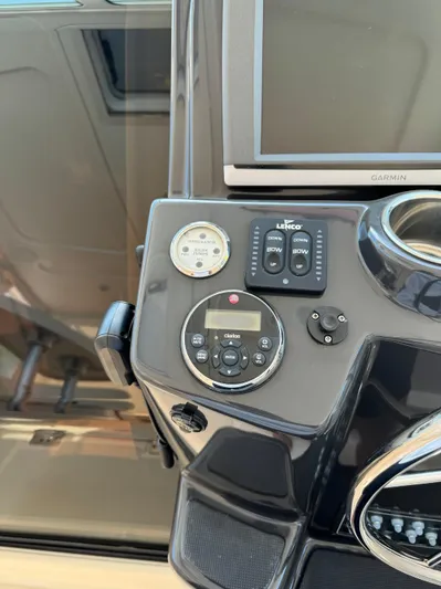  Yacht Photos Pics Control panel of a 2012 Tiara Yachts 3100 Open with navigation instruments.