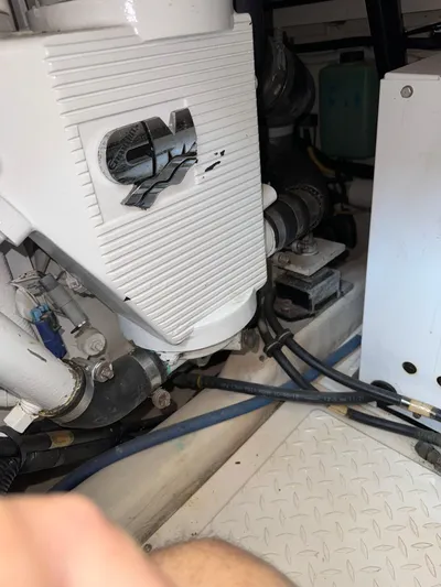  Yacht Photos Pics Engine compartment of a 2012 Tiara Yachts 3100 Open, showcasing mechanical components.