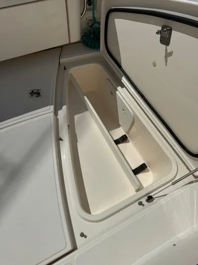  Yacht Photos Pics 2012 Tiara Yachts 3100 Open storage compartment with open lid, showcasing interior space.