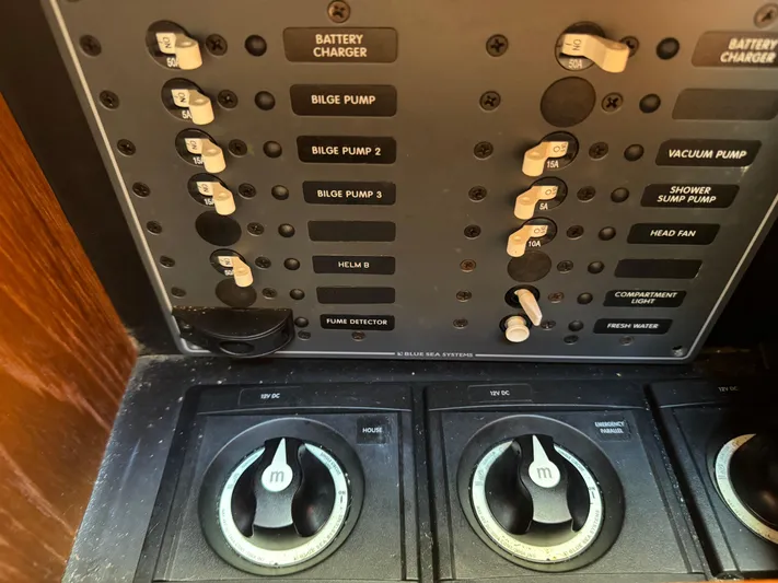  Yacht Photos Pics Control panel of a 2012 Tiara Yachts 3100 Open, featuring switches and dials.
