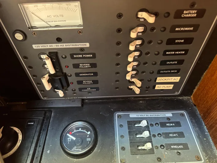  Yacht Photos Pics Electrical panel of a 2012 Tiara Yachts 3100 Open, showing switches and gauges.