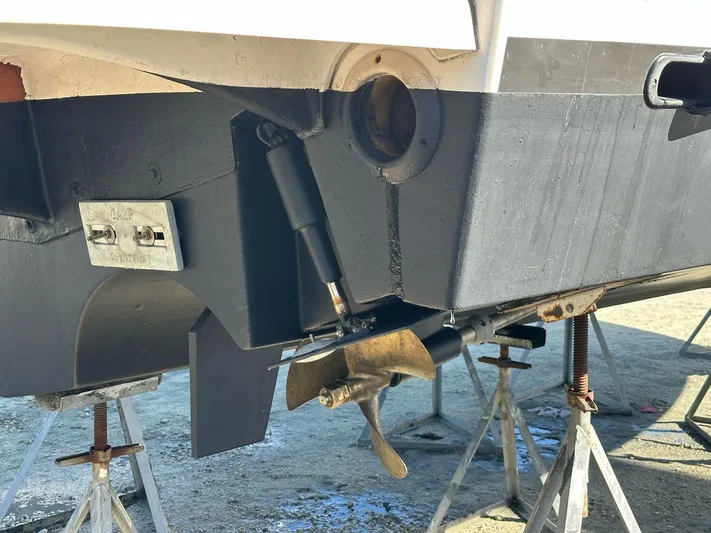  Yacht Photos Pics 2012 Tiara Yachts 3100 Open boat hull and propeller on stands.