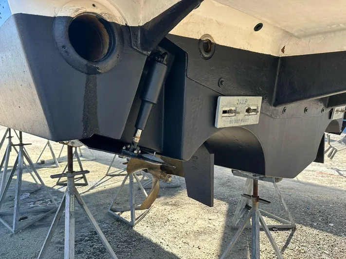  Yacht Photos Pics 2012 Tiara Yachts 3100 Open boat hull and propeller on stands.