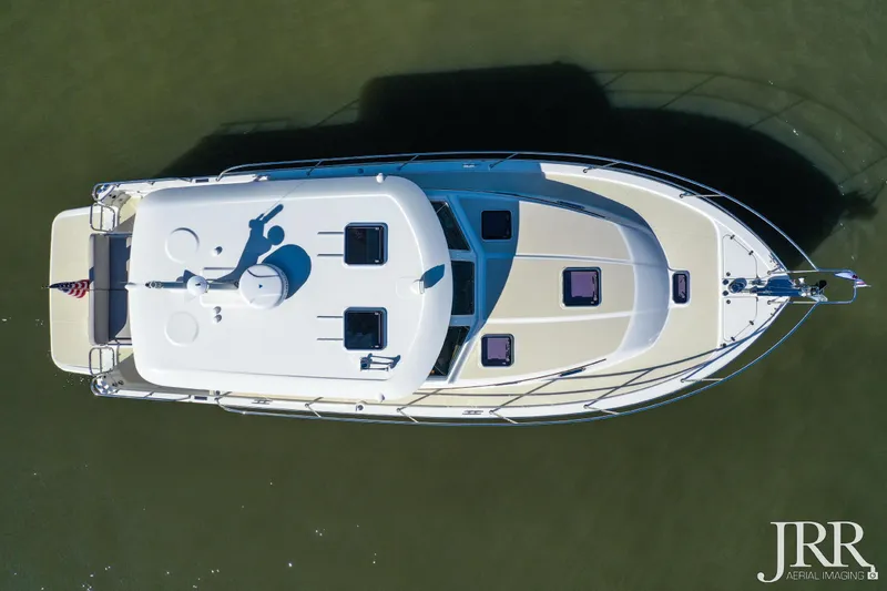 Serendipity Yacht Photos Pics Overhead view of 2019 Sabre 38 Salon Express yacht on water.