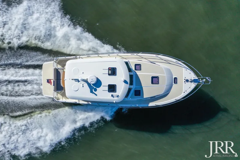 Serendipity Yacht Photos Pics Aerial view of 2019 Sabre 38 Salon Express cruising on water.