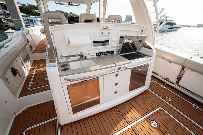 The Tyder II Yacht Photos Pics 2018 42 Boston Whaler 420 Outrage The Tyder II Cockpit Galley