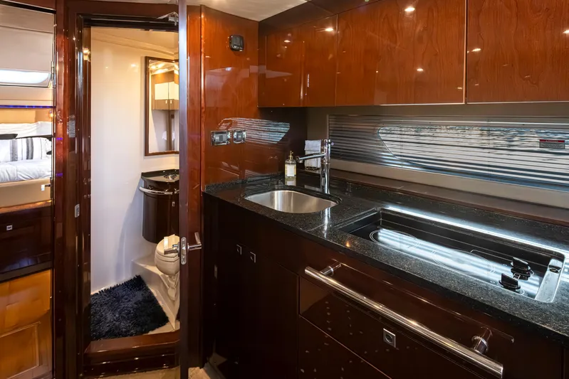  Yacht Photos Pics Luxurious 2010 Sea Ray Sundancer yacht interior with modern kitchen and bathroom.