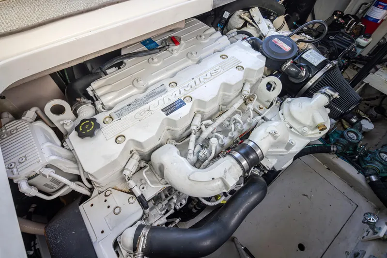  Yacht Photos Pics Engine compartment of a 2010 Sea Ray Sundancer boat, featuring a Cummins engine.