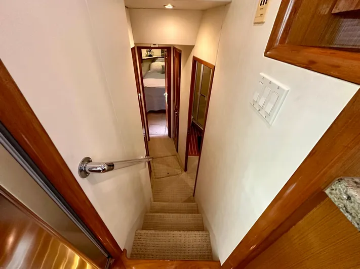 Bebe Yacht Photos Pics Stairway inside 1999 Viking 60 Cockpit Sports Yacht, leading to lower cabin area.