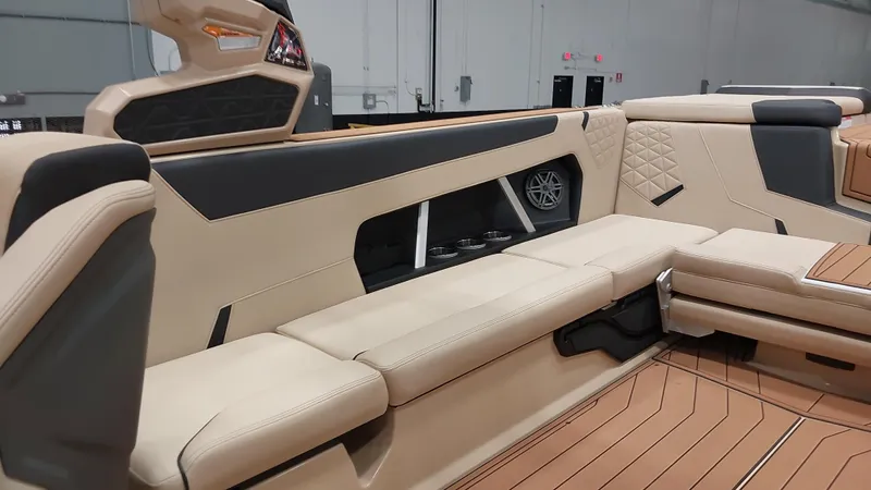  Yacht Photos Pics 2025 Nautique GS24 interior with beige seating and modern design elements.